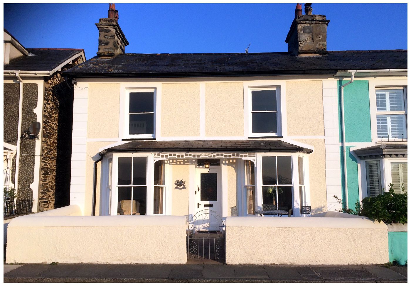 Beautiful terraced cottage against blue skies